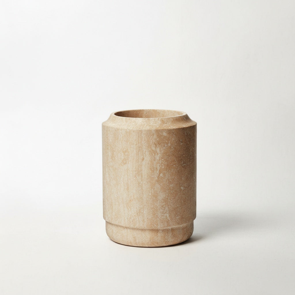 Beige marble cylindrical utensil holder and vessel front view