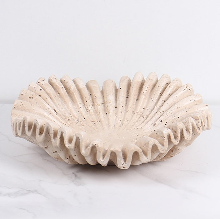 Angled view of sculptural stone bowl texture