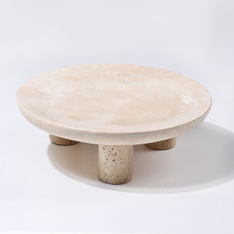 Empty round travertine footed stand