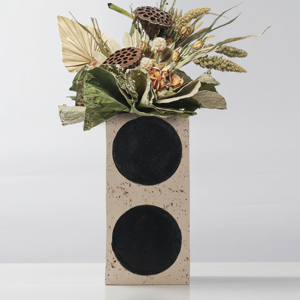 Beige travertine rectangular vase with dried flowers