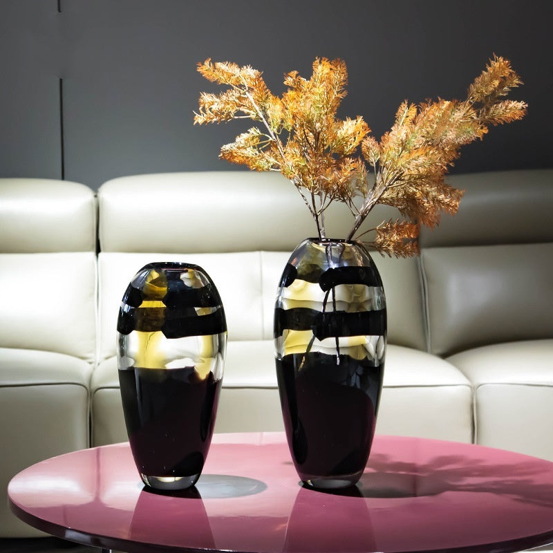 Set of Black & Amber Glass Vases on Pink Table