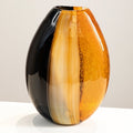 Solo shot of black and amber oval glass vase