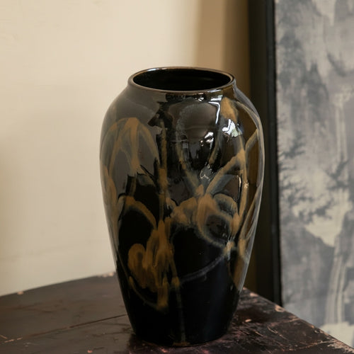 Large black ceramic vase with amber abstract glaze