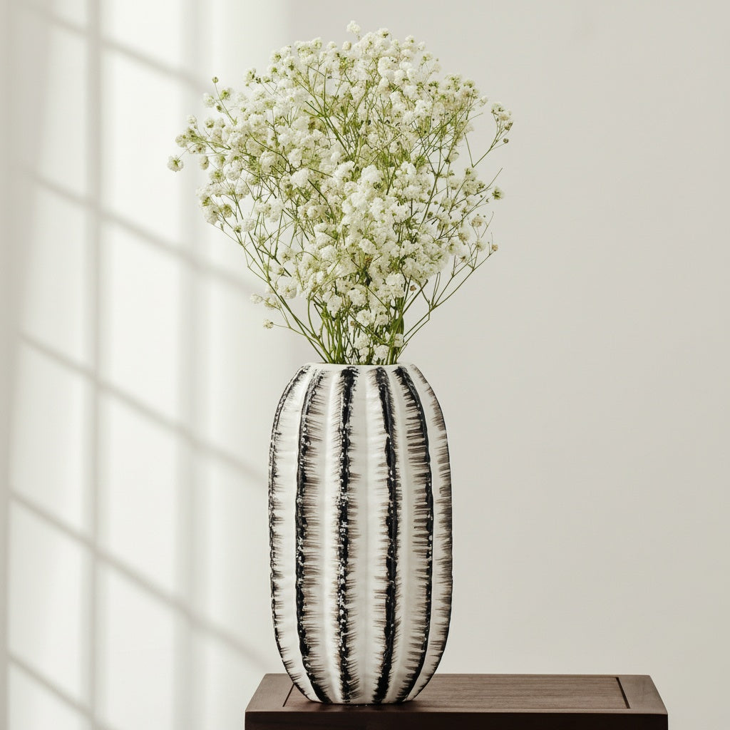 Black And White Ceramic Oval Vase Styled with Flowers