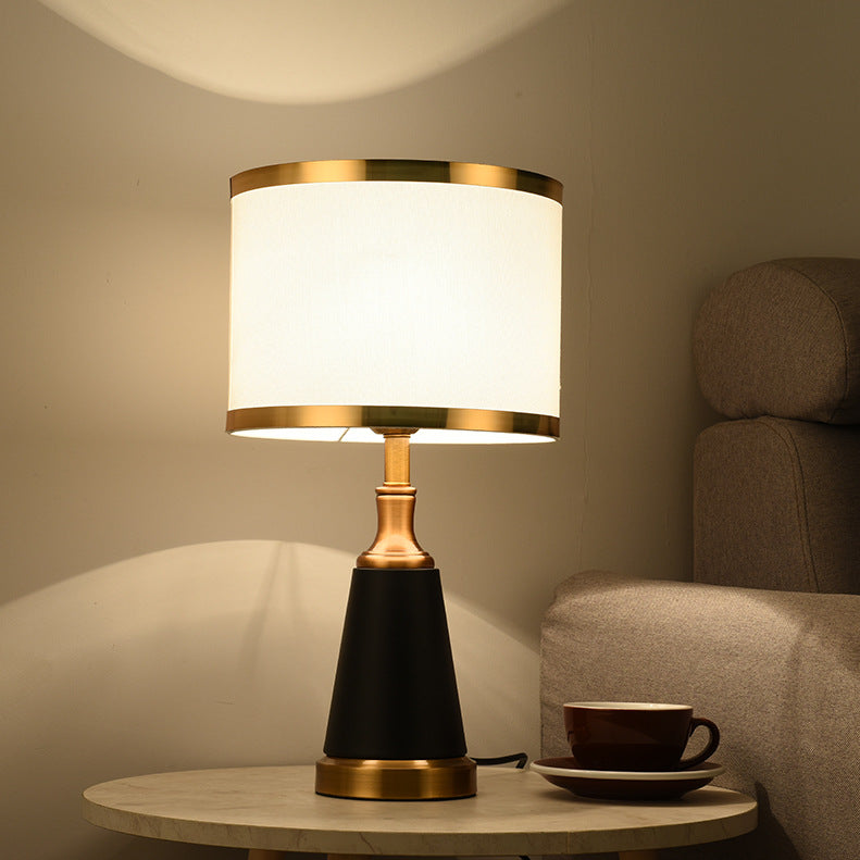 Angled view of lit table lamp in living room setting