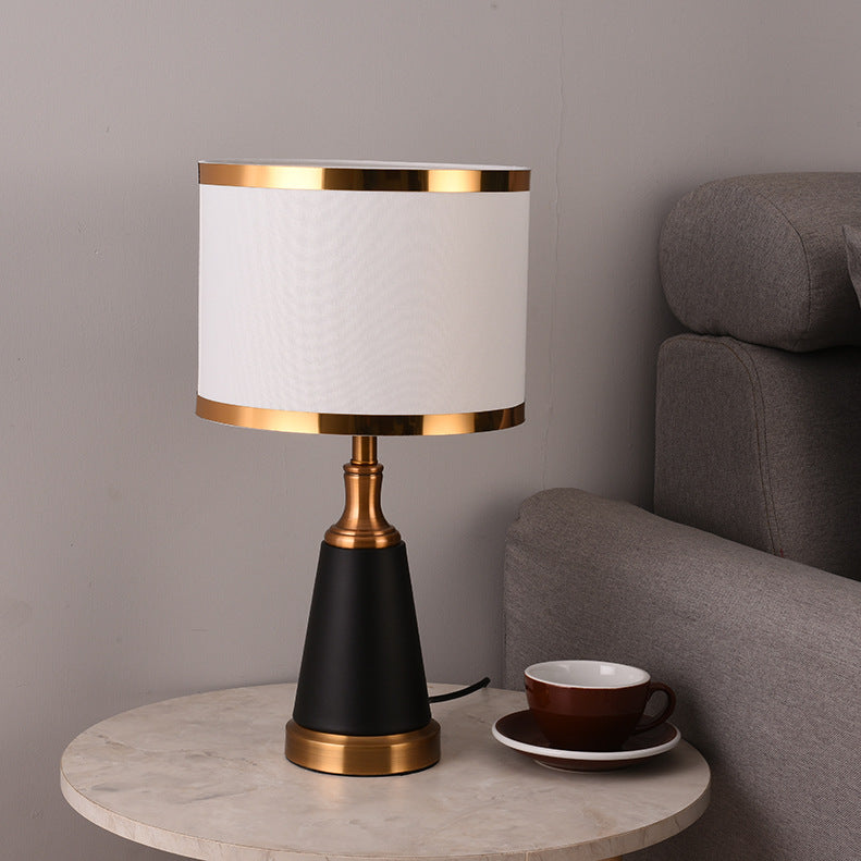 Angled view of unlit lamp on side table