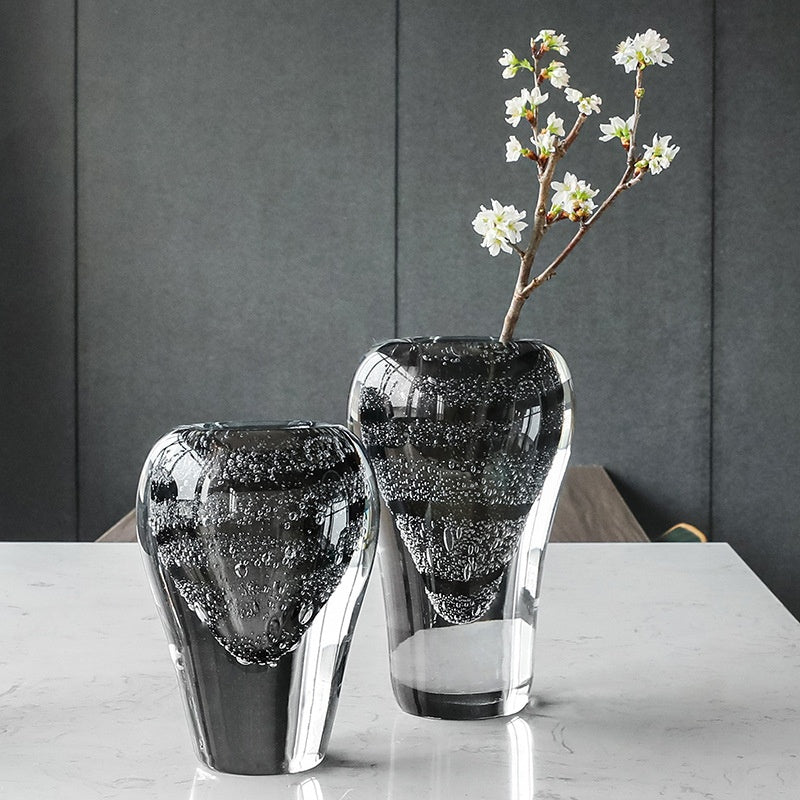 Front view of two art glass vases with bubble texture