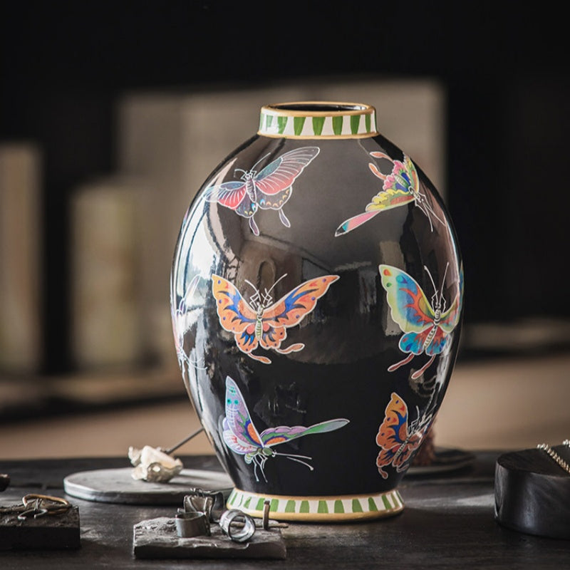 Close up of black butterfly vase showing geometric rim details