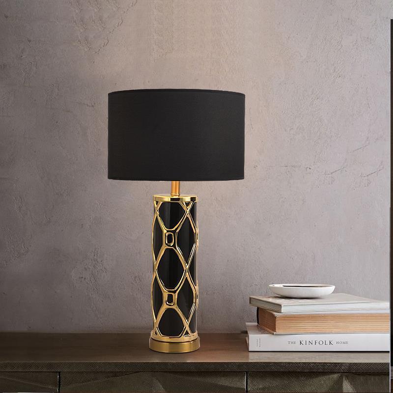 Luxury black and gold geometric table lamp on console