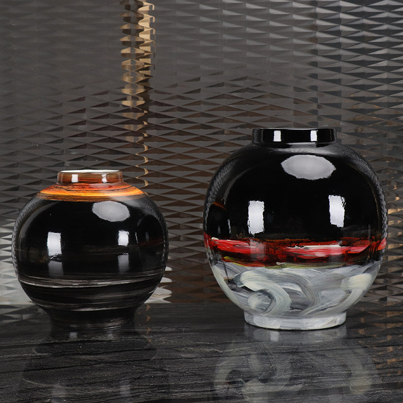 Group shot of large and medium black ceramic vases