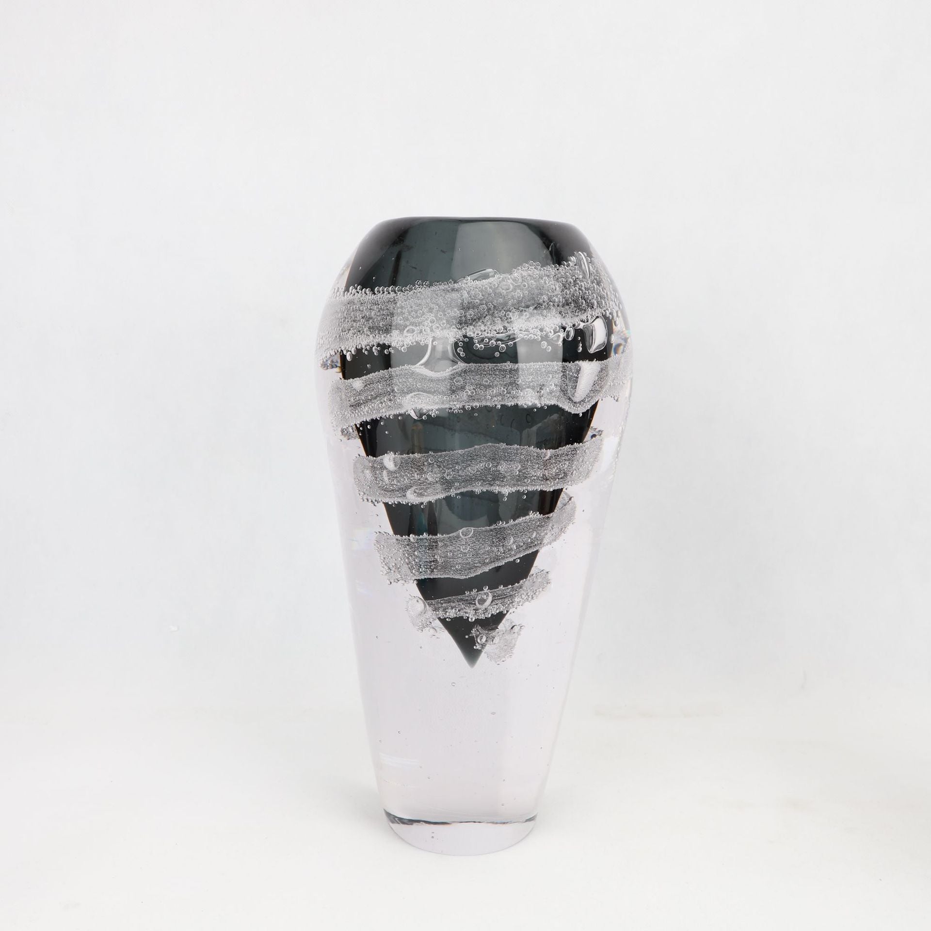 Large black glass vase with textured white spiral