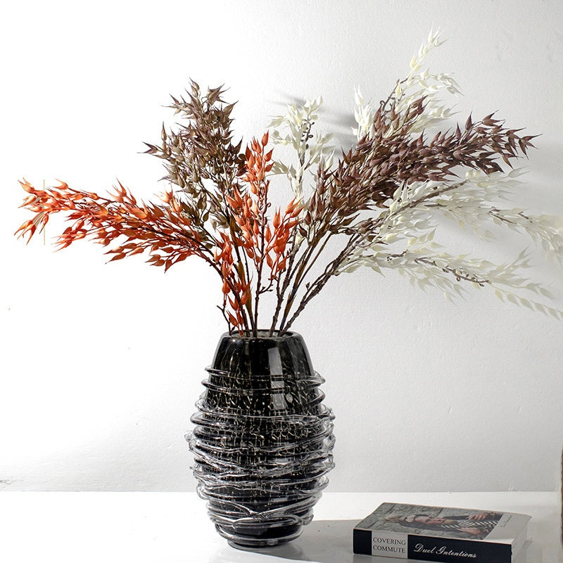 Large black crackle glass vase with dried botanicals