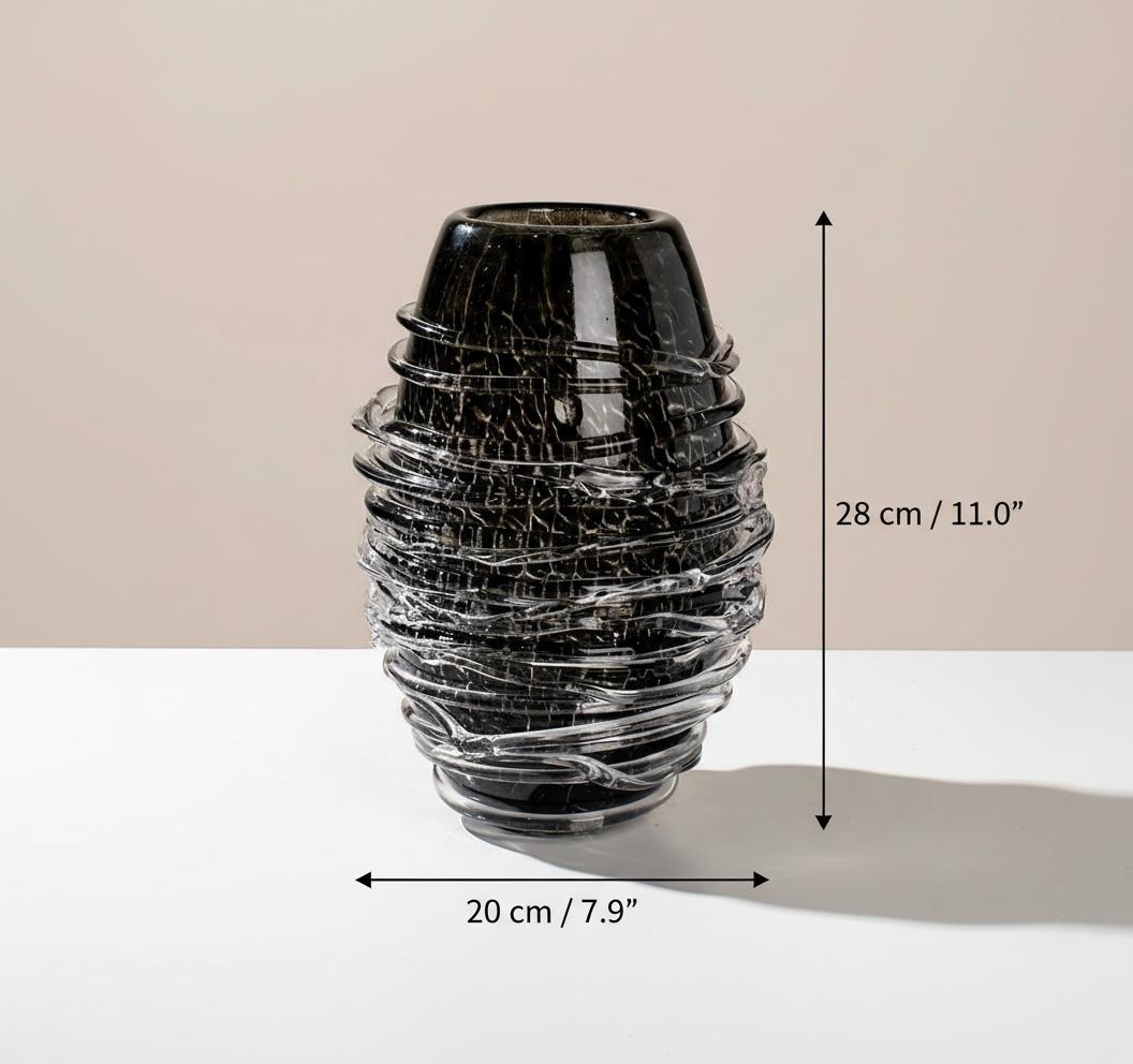 Close up of black crackle glass texture and clear spiral wrap