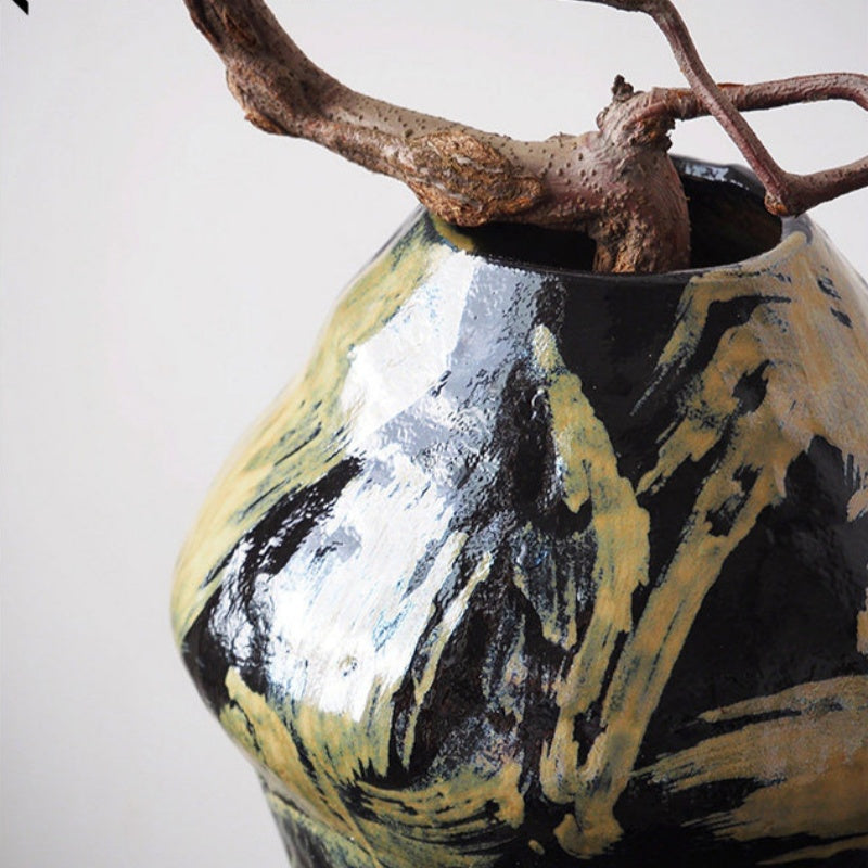 Detail view of ceramic vase rim and glossy glaze finish
