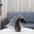 Side profile of black and clear glass horse sculpture