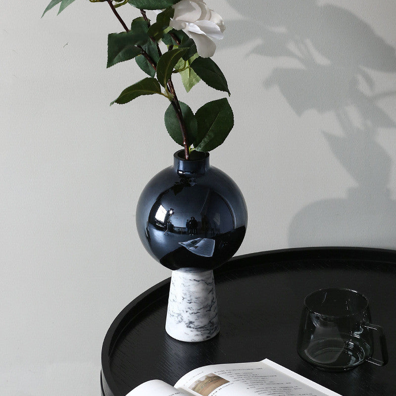 Black glass vase with white flower styling