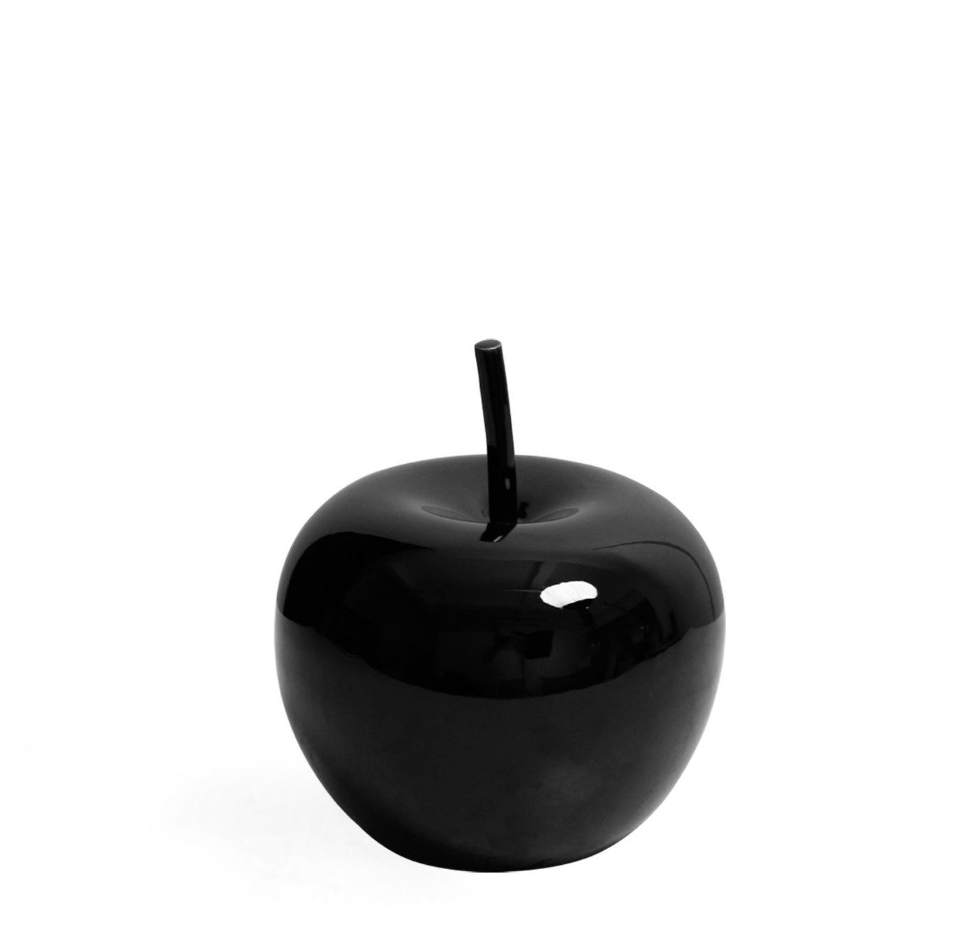 Side profile of minimalist black apple sculpture