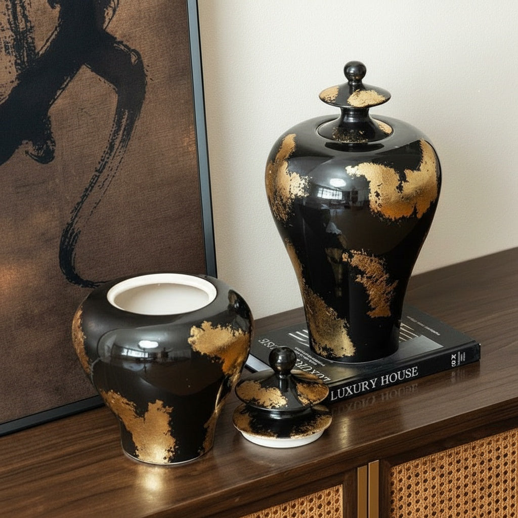 Luxury home decor styling with black and gold ginger jars