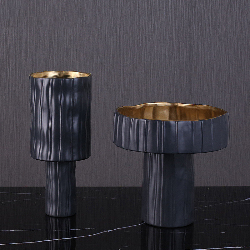 Matte black and gold ceramic vases group shot