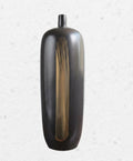 Front view of large black ceramic vase with gold brushstroke art