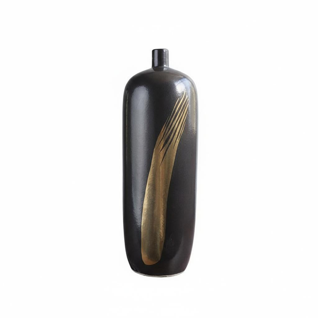Angled view of medium black ceramic vase with gold detail