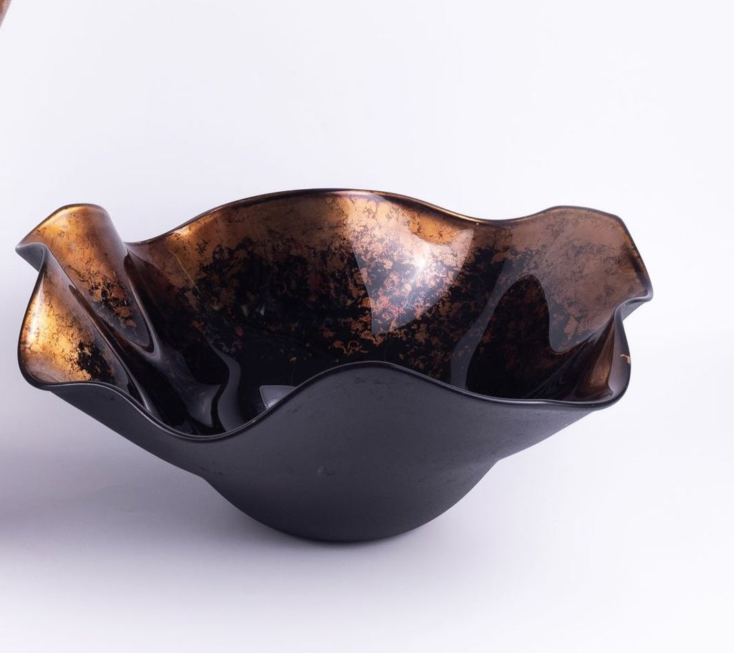 Black glass centerpiece bowl with ruffled rim