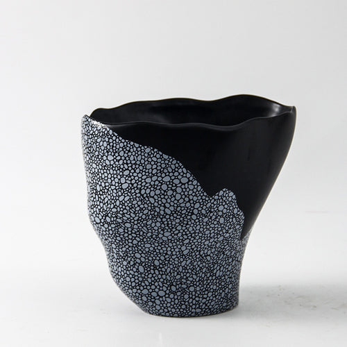 Large black and grey organic wavy vase side view