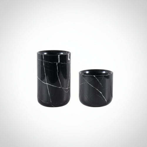 Set of two black marble cylindrical vases