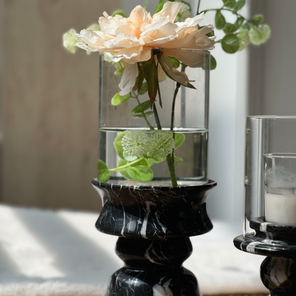 Close up of sculptural black marble vase base