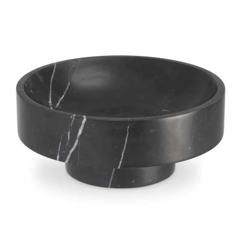 Isolated view of black marble footed bowl showing white veining