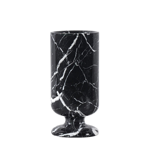 Solid black marble vase with white veining side view