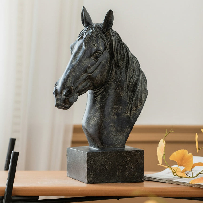 Side view of dark resin horse sculpture on table