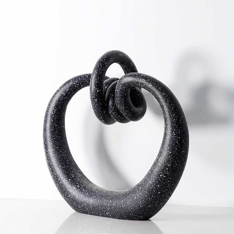 Rounded loop resin knot statue front view