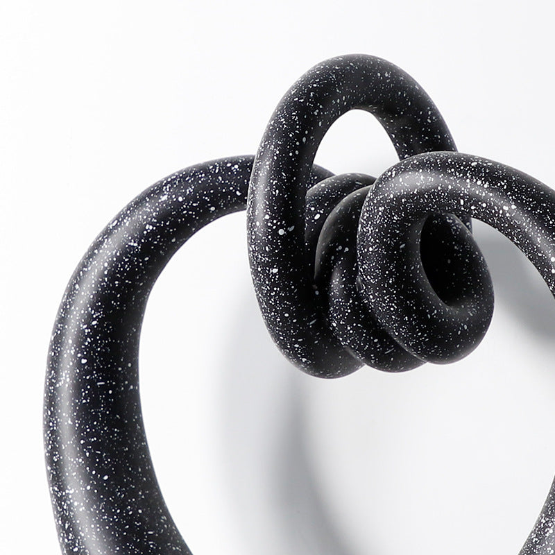 Close up detail of speckled black resin knot texture