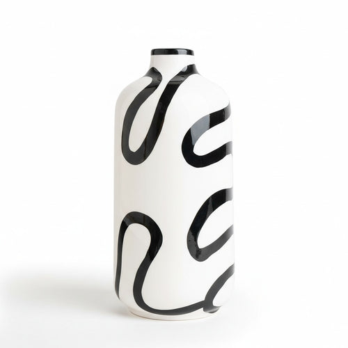Front view of black and white abstract ceramic vase on white background