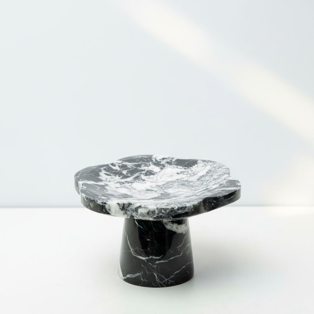 Black and white marble scalloped pedestal stand