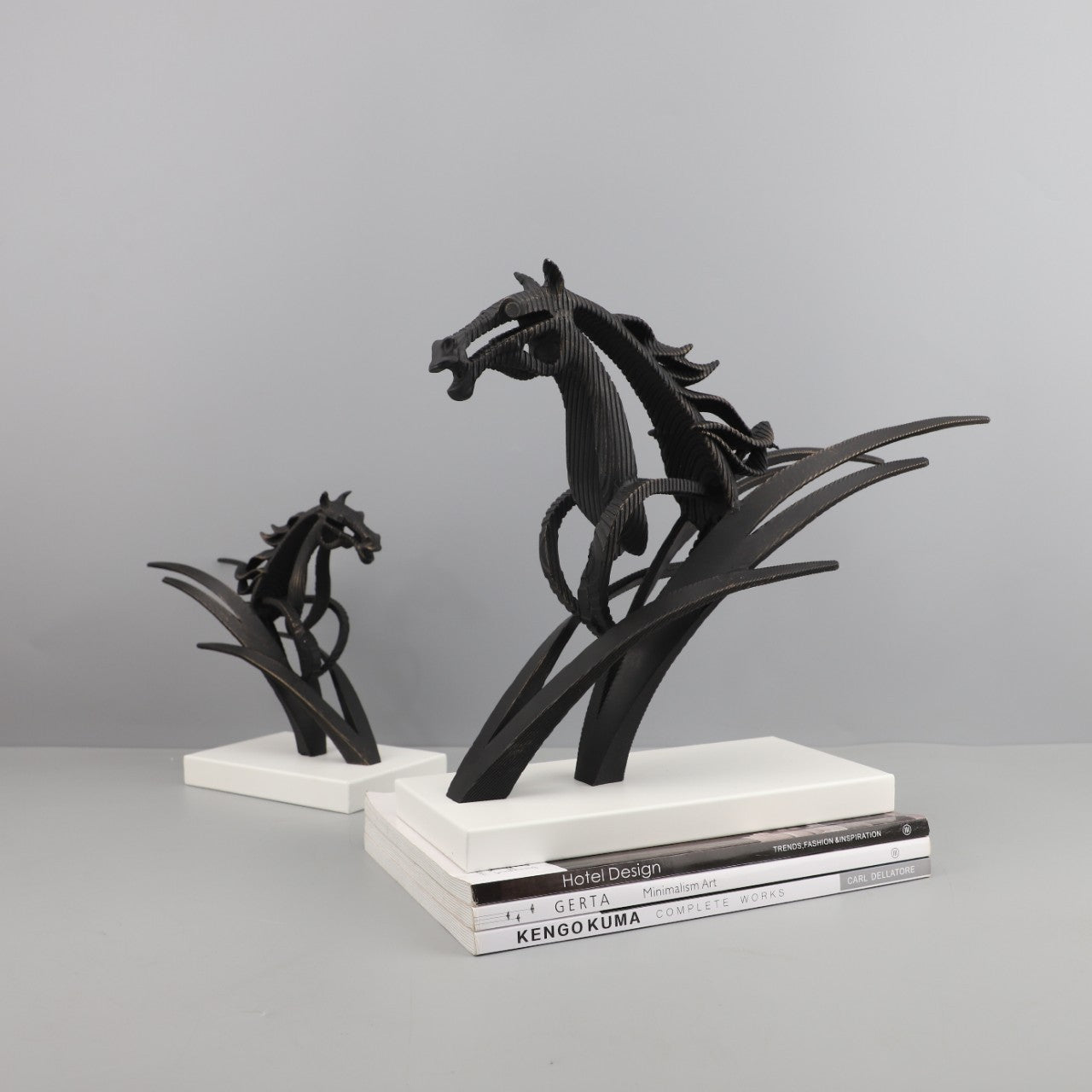 Solo view of the large blackened metal horse sculpture