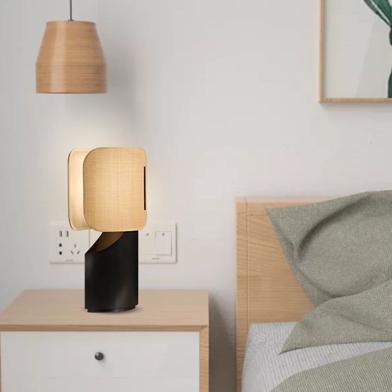 Lamp illuminated in a bedroom setting