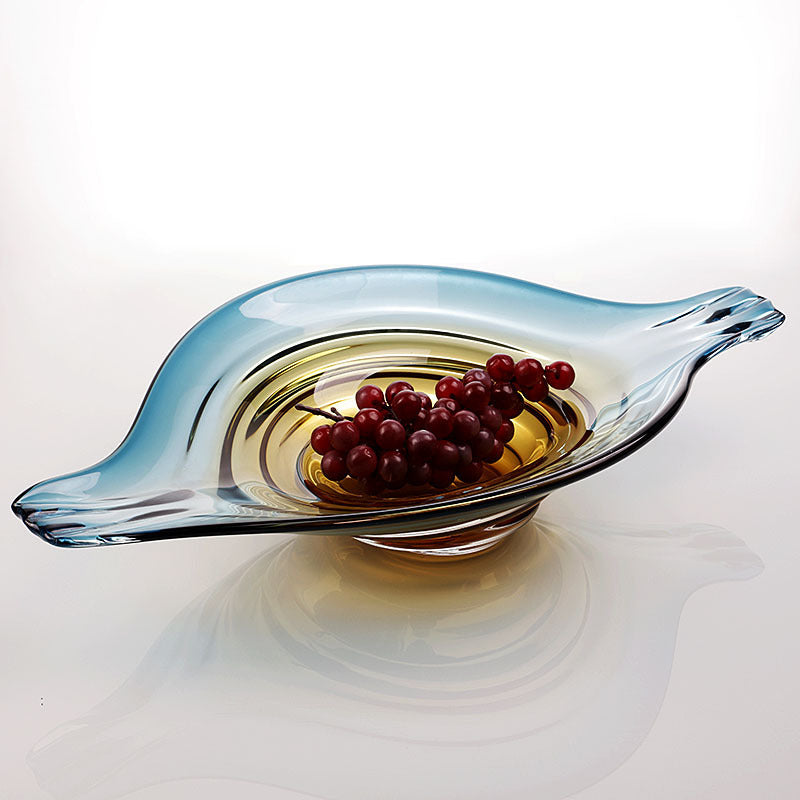 Side profile of organic glass bowl with fruit