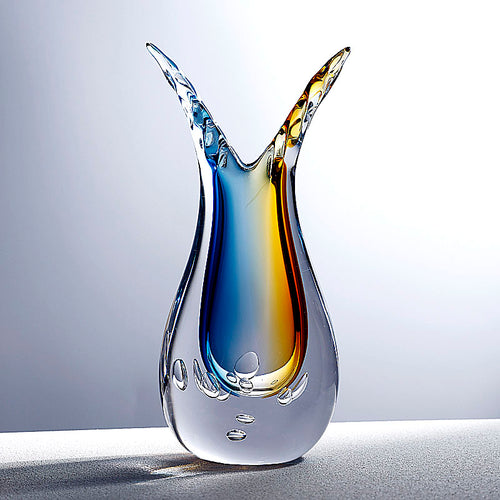 Blue and amber art glass vase with split neck design and encased bubbles