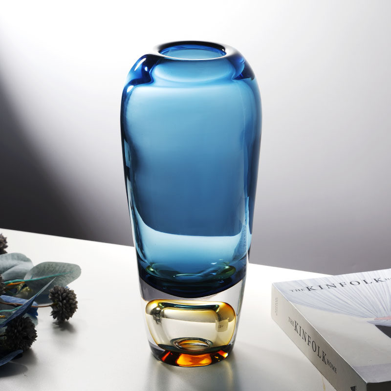 Front view of blue and amber glass vase
