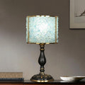 Front view of blue amethyst table lamp unlit