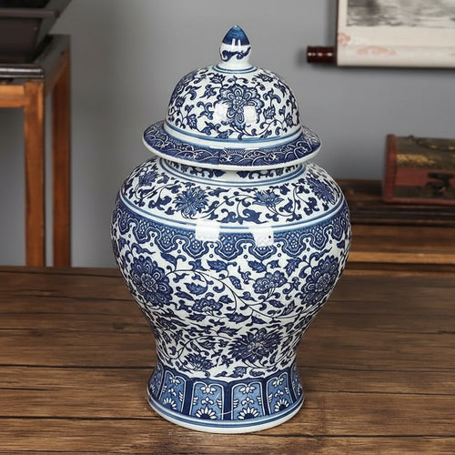 blue and white porcelain lidded jar floral pattern on wooden table classic decorative ginger jar