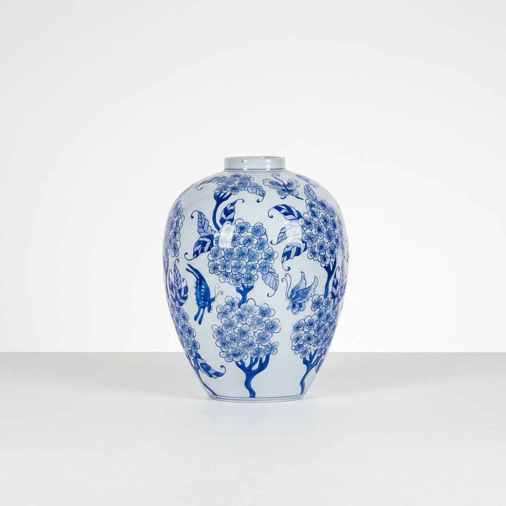 Blue and white porcelain ovoid vase on white background