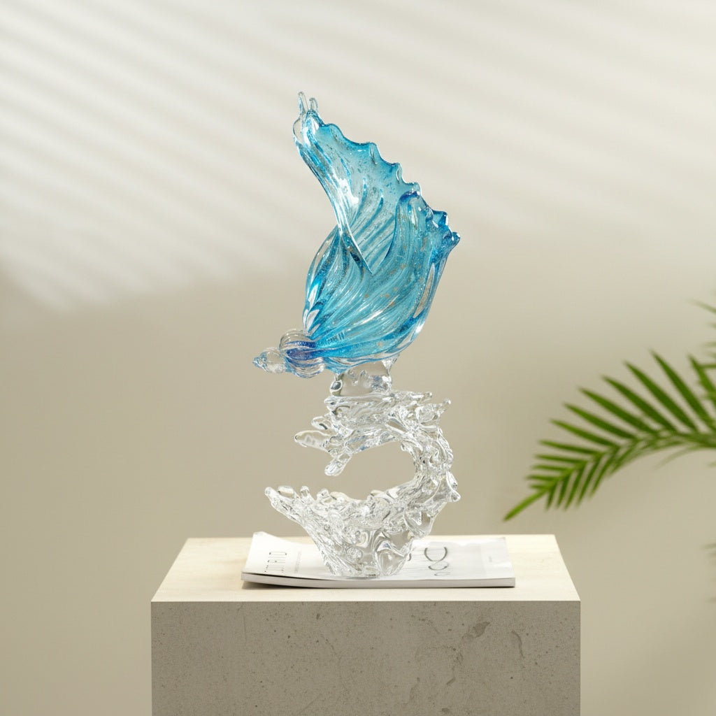 Blue glazed glass abstract shell sculpture on clear wave base