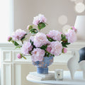 Blue floral porcelain footed vase with pink peonies