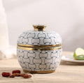 Front view of geometric pattern lidded jar