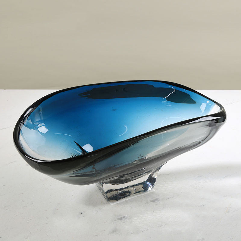 Angled view of blue and smoky organic glass bowl