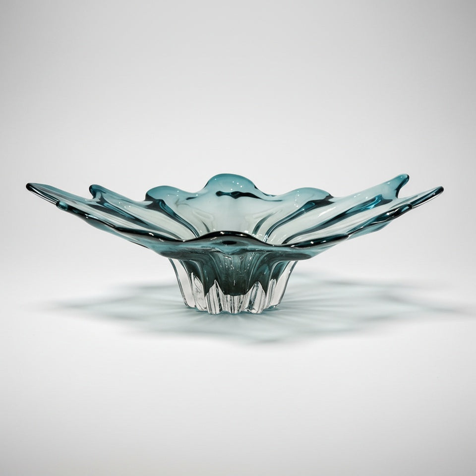 Side profile of blue glass organic centerpiece bowl isolated