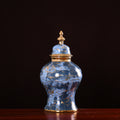 Large blue ceramic ginger jar with gold details